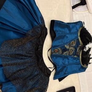 Elegant Blue and Black Dress with Gold Accents